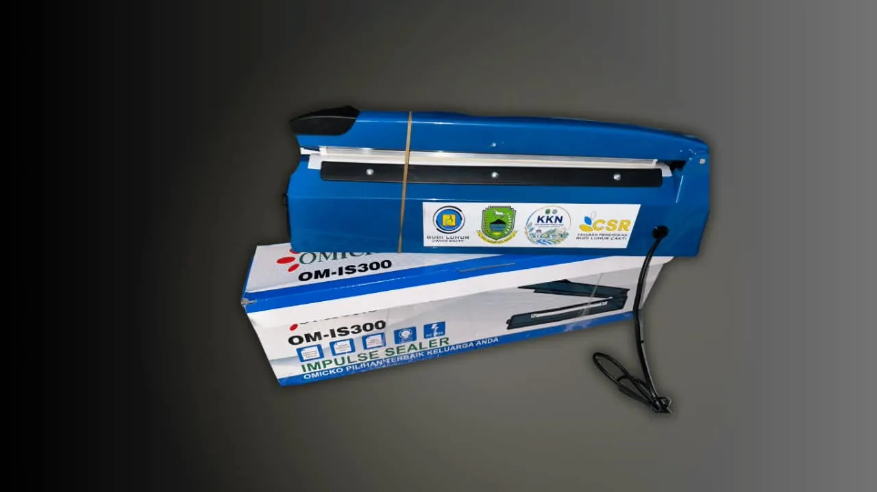 Alat press kemasan berwarna biru yang digunakan untuk menutup kemasan produk UMKM.